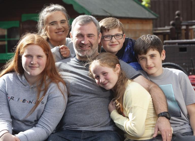 image of Malcom Armstrong, organ transplant recipient, and his family