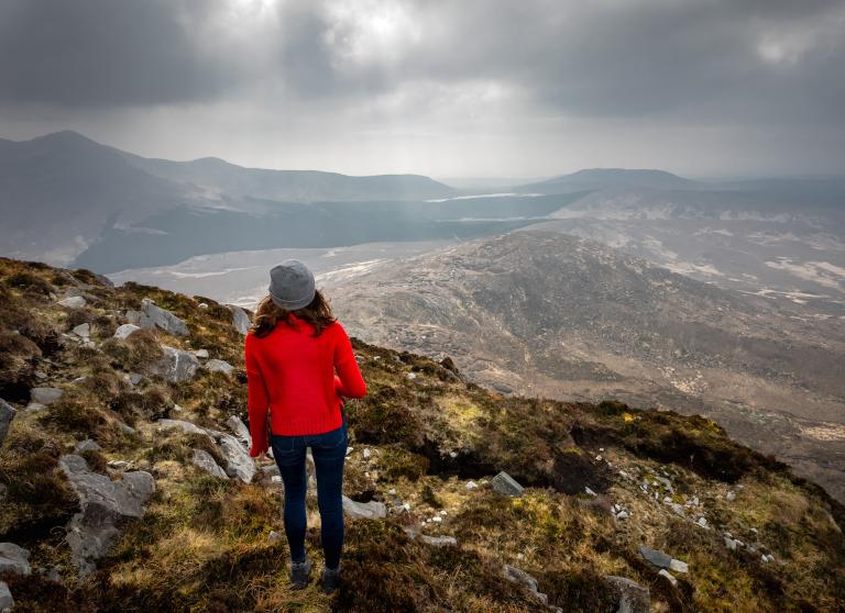 image of woman on mountain top