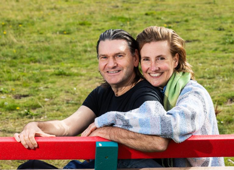Man and woman on park bench